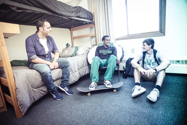 UWGB students guys in a campus dorm room