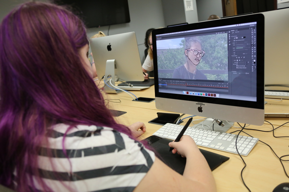 Student working on animation at a computer