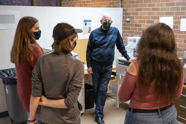 Phil Hauck meets with students