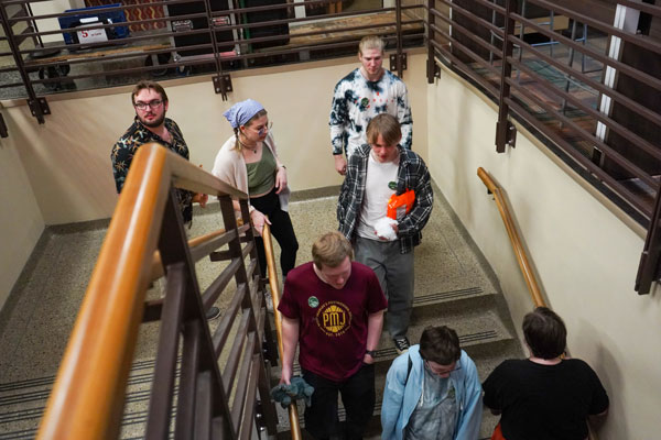 Students walking down stairs in the university union