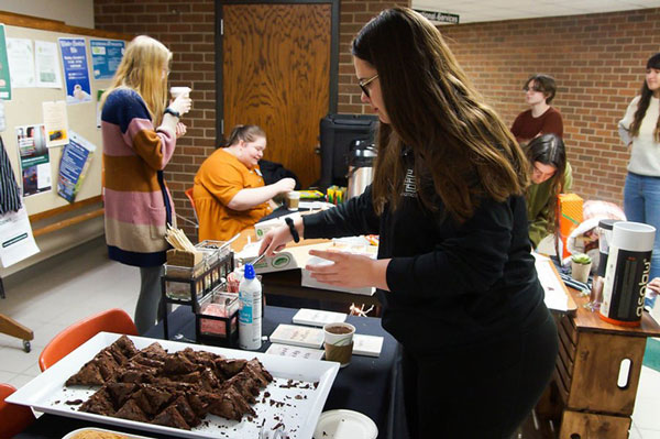 A campus booth space checked out by a sorority