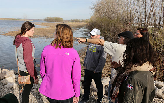 Group of people by the lake