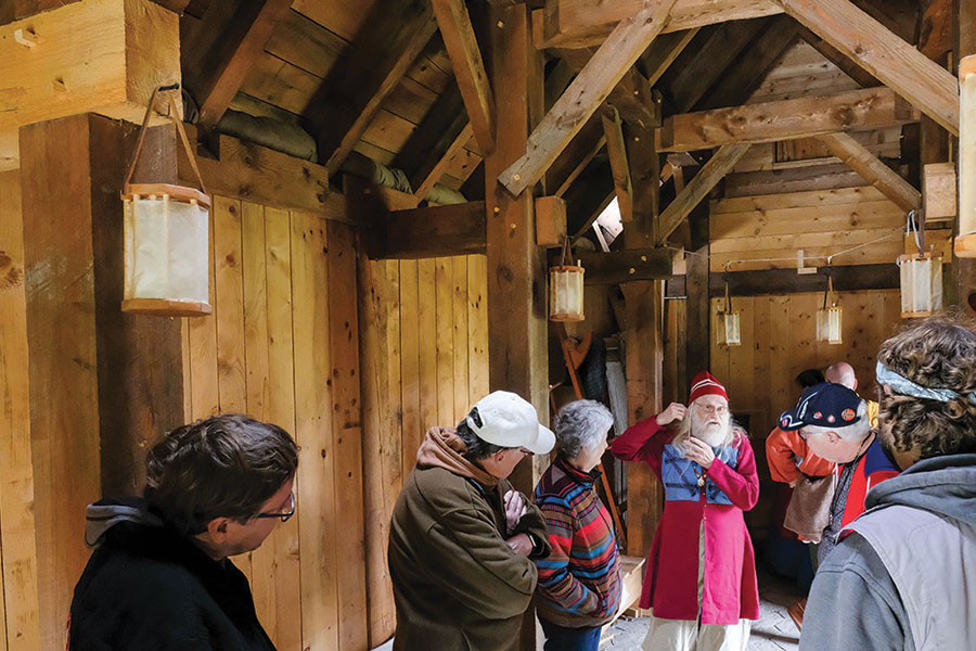 The inside of the Viking House with people inside.