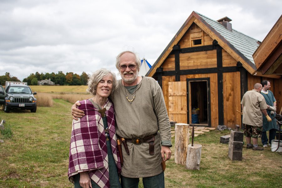 Owen and Elspeth standing in front of the Viking House in its previous location.