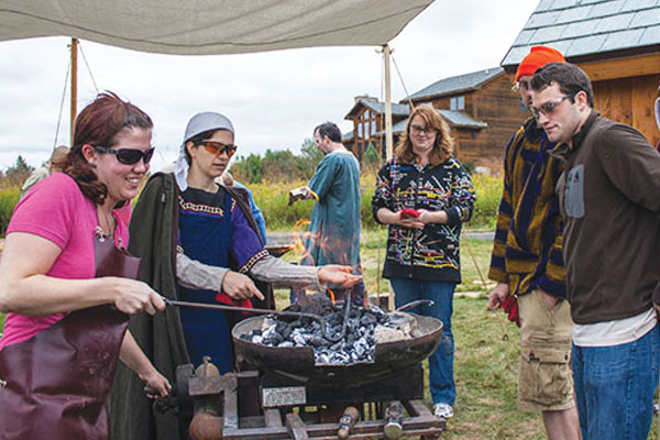 Students participate in viking metalworks