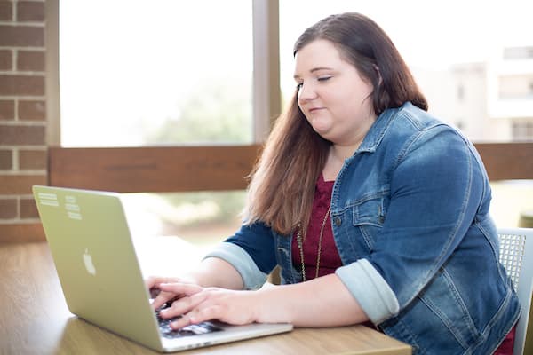 students on laptop