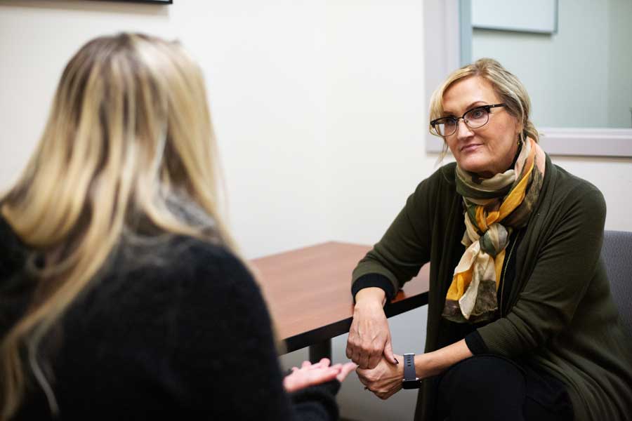 UW-Green bay student speaks with counselor
