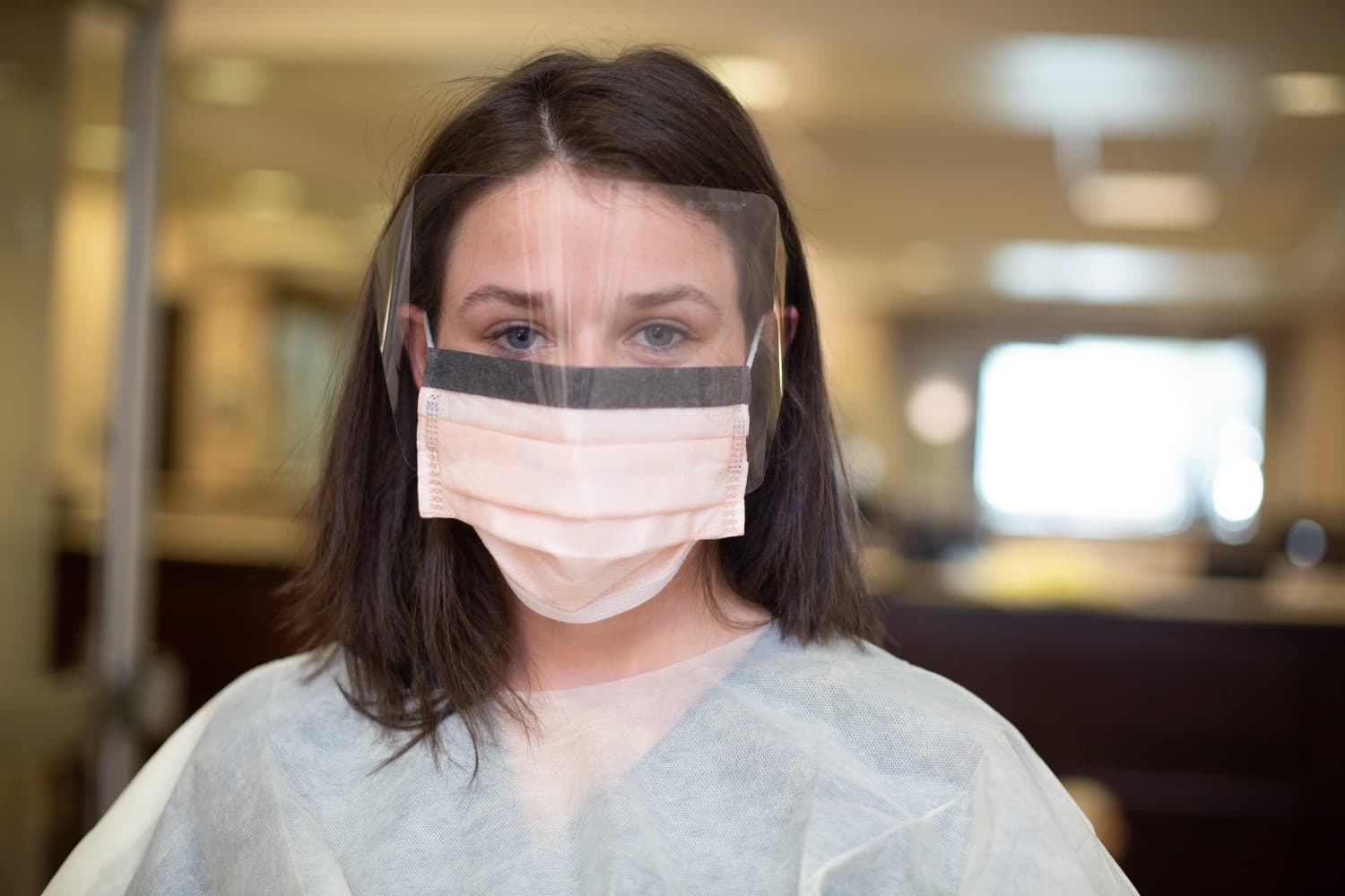 close-up of nurse in mask