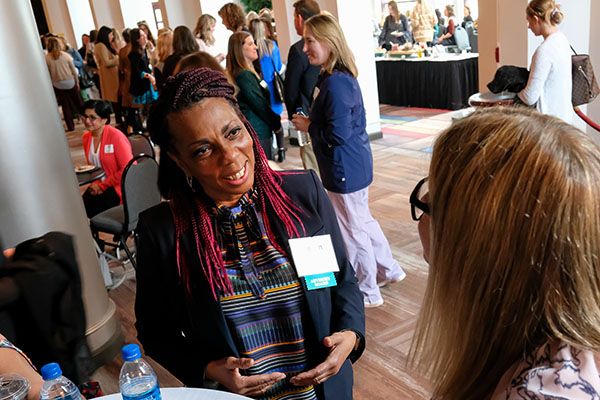 Robyn Davis networking at event