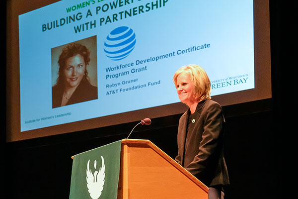 Sheryl Van Gruensven speaking at event
