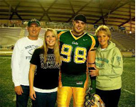 Butch Reimer with his wife and children.