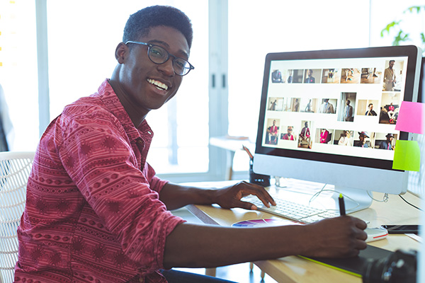 Graphic designer at desk