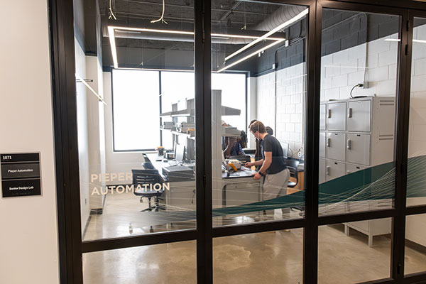Electrical Engineering students work in the TEAMS Electrical Engineering Senior Design Lab at UW-Green Bay