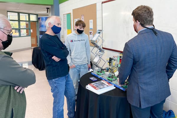 Student presents project to public