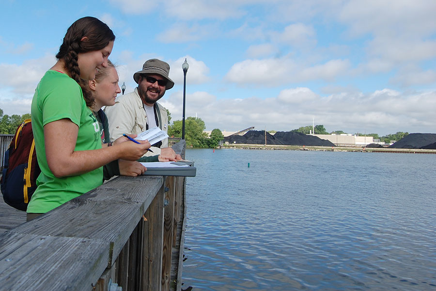 Students collecting data near Fox River