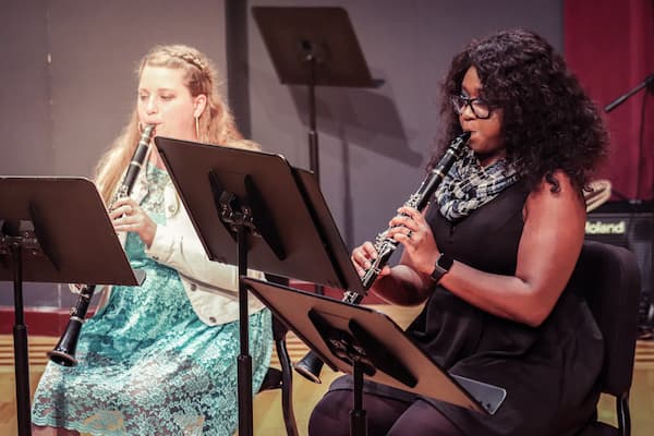 Students practice for woodwind ensemble