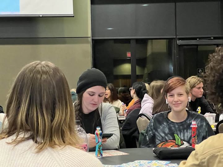 People sitting at a table playing bingo