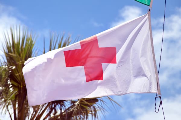 Red Cross flag blows in the wind
