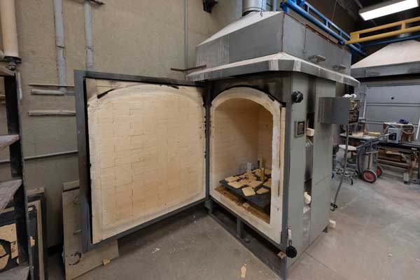 Open kiln in ceramic studio