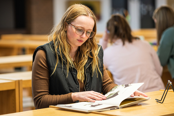 Student reading book