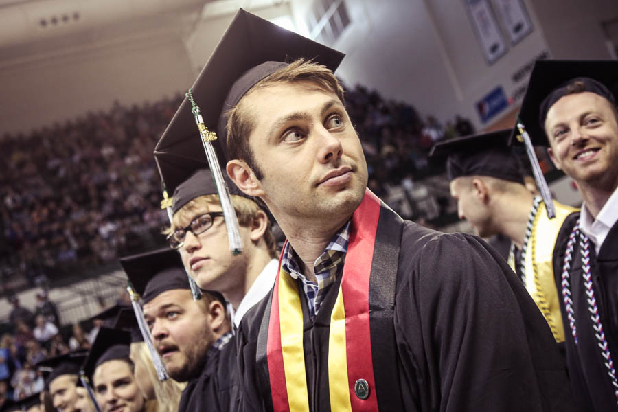 A UWGB student taking in their surroundings during graduation.