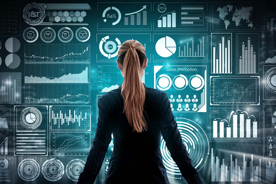 Executive Impact MBA hero image of a business woman facing data