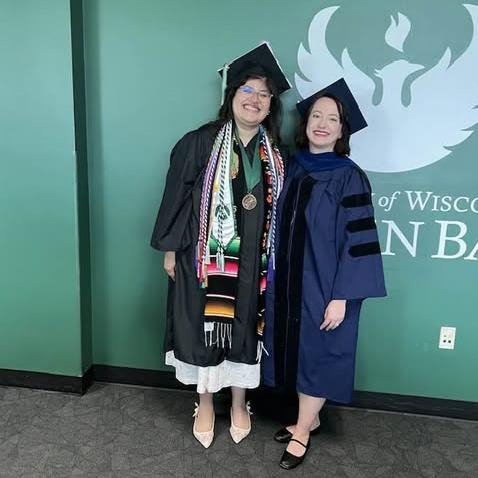 Female graduate with professor
