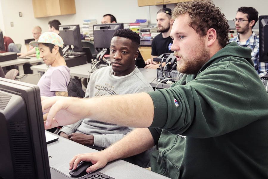 Studentw working together in a computer science classrom