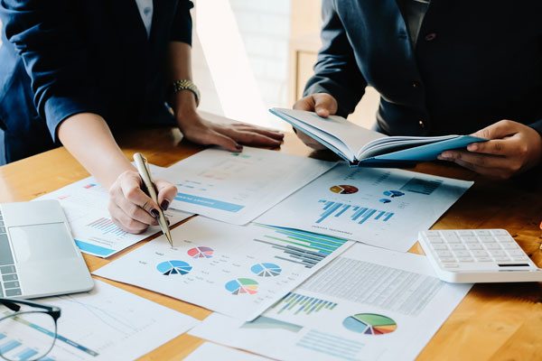 Marketers going over analytics