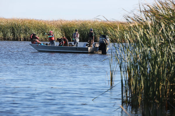 Students on small boat