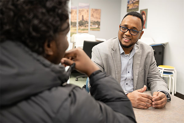 Applied leadership Ed.D. student Said Hassan at work at COSMA.