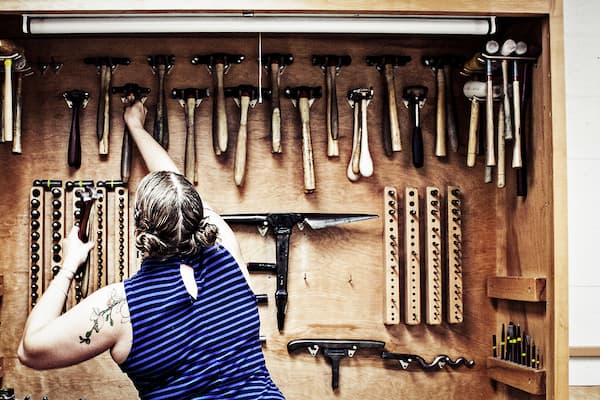 Barbi Gossen choices tools in jewelry and metalsmithing studio