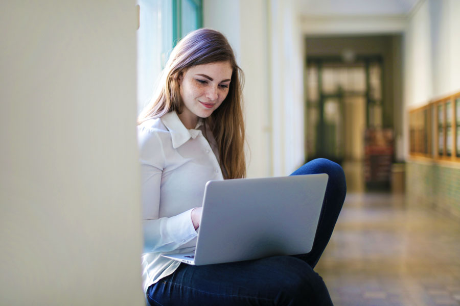 Female student attending class online