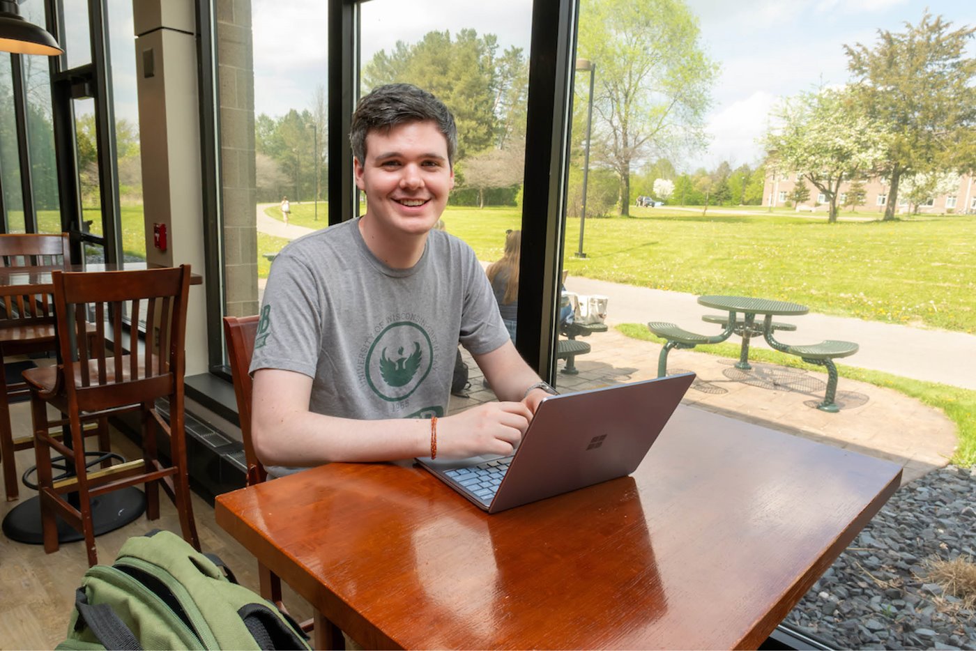 A student studies with their laptop in the Union coffeehouse