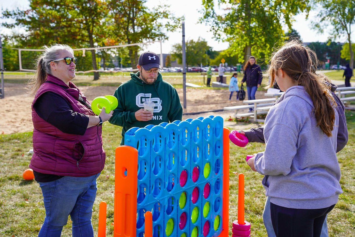 A family plays a game of giant Connect 4 in Phoenix Park during Family Weekend