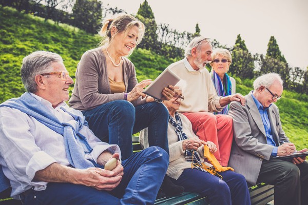 activity director with a group of older people