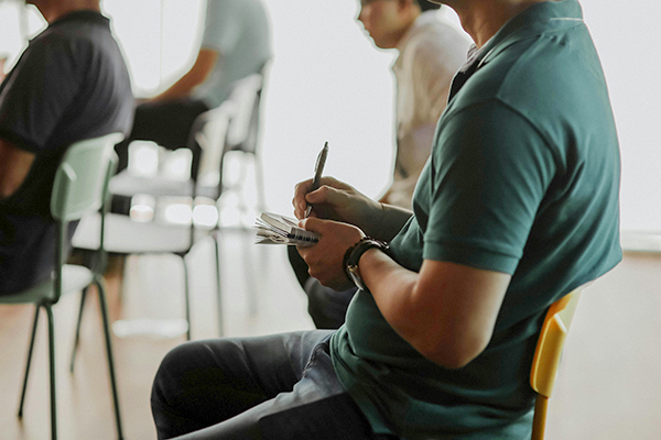 A person taking notes