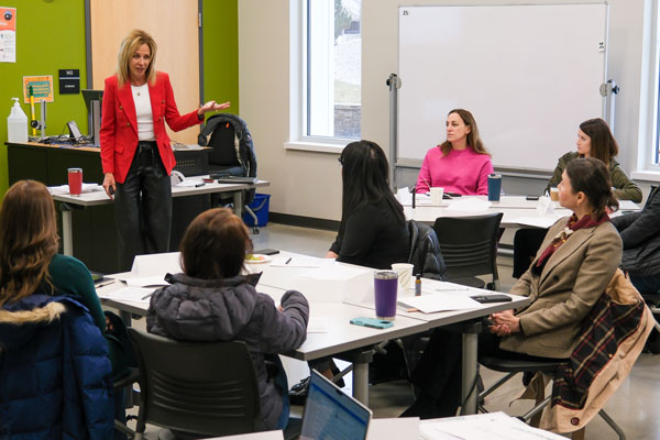 Teaching giving lecture to students