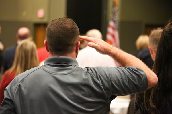 Male salutes at Veterans Reception