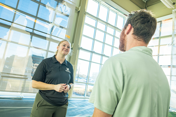 Two students talking in Kress Center