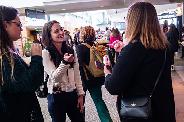 three women talking at Nonprofit Conference