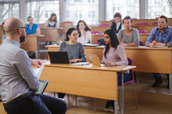 Professor giving lecture in class