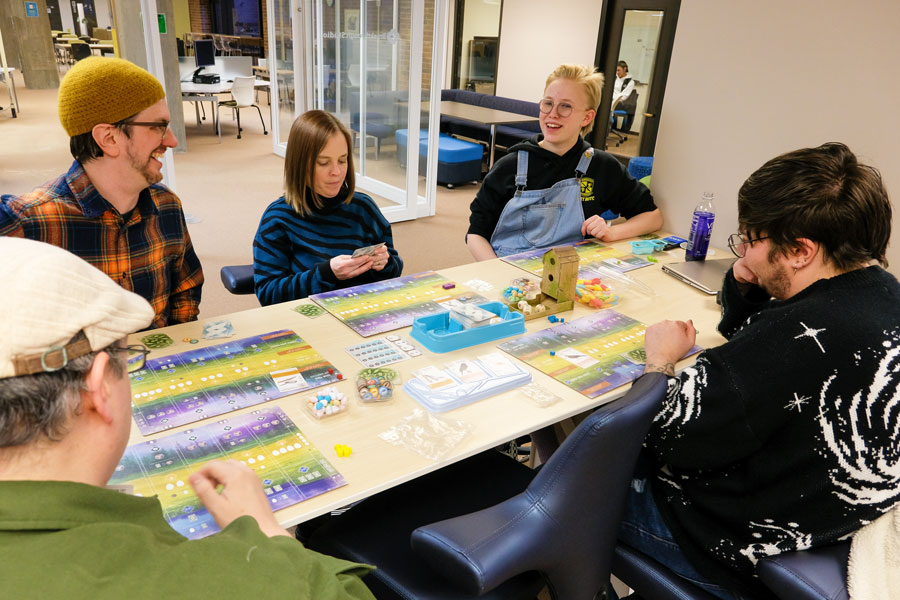 Group of students playing board games at UW-Green Bay Board Game Night