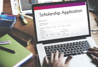 Scholarship application homepage on a laptop