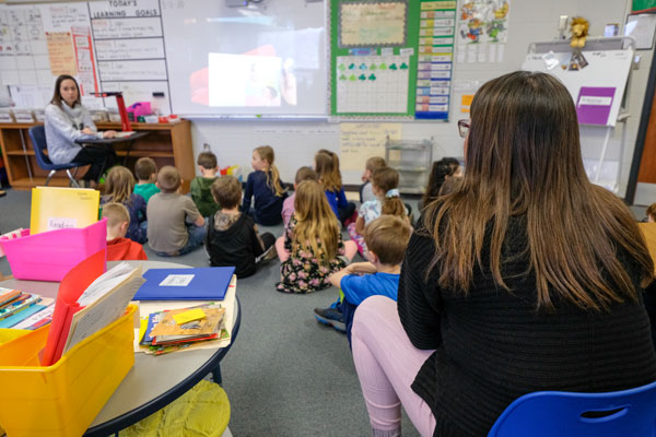 Student teacher teaching in a classroom.