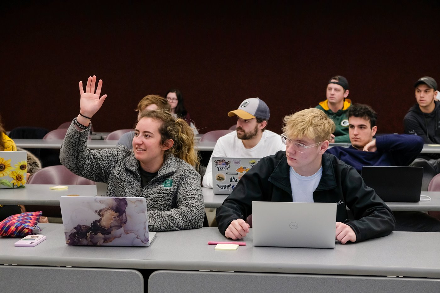Students in a classroom listening to instruction