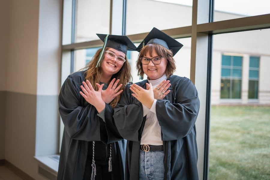 Students give phoenix hands at UW-Green Bay graduation