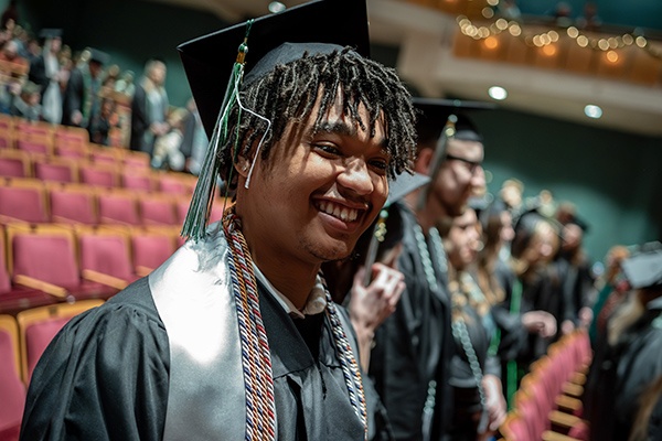 Smiling student at commencement