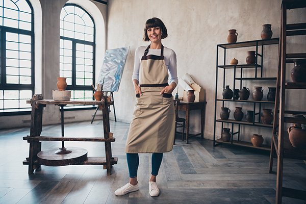 Woman in ceramics gallery