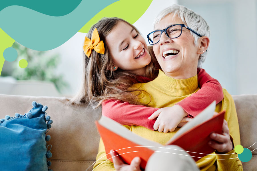 grandmother laughing with granddaughter